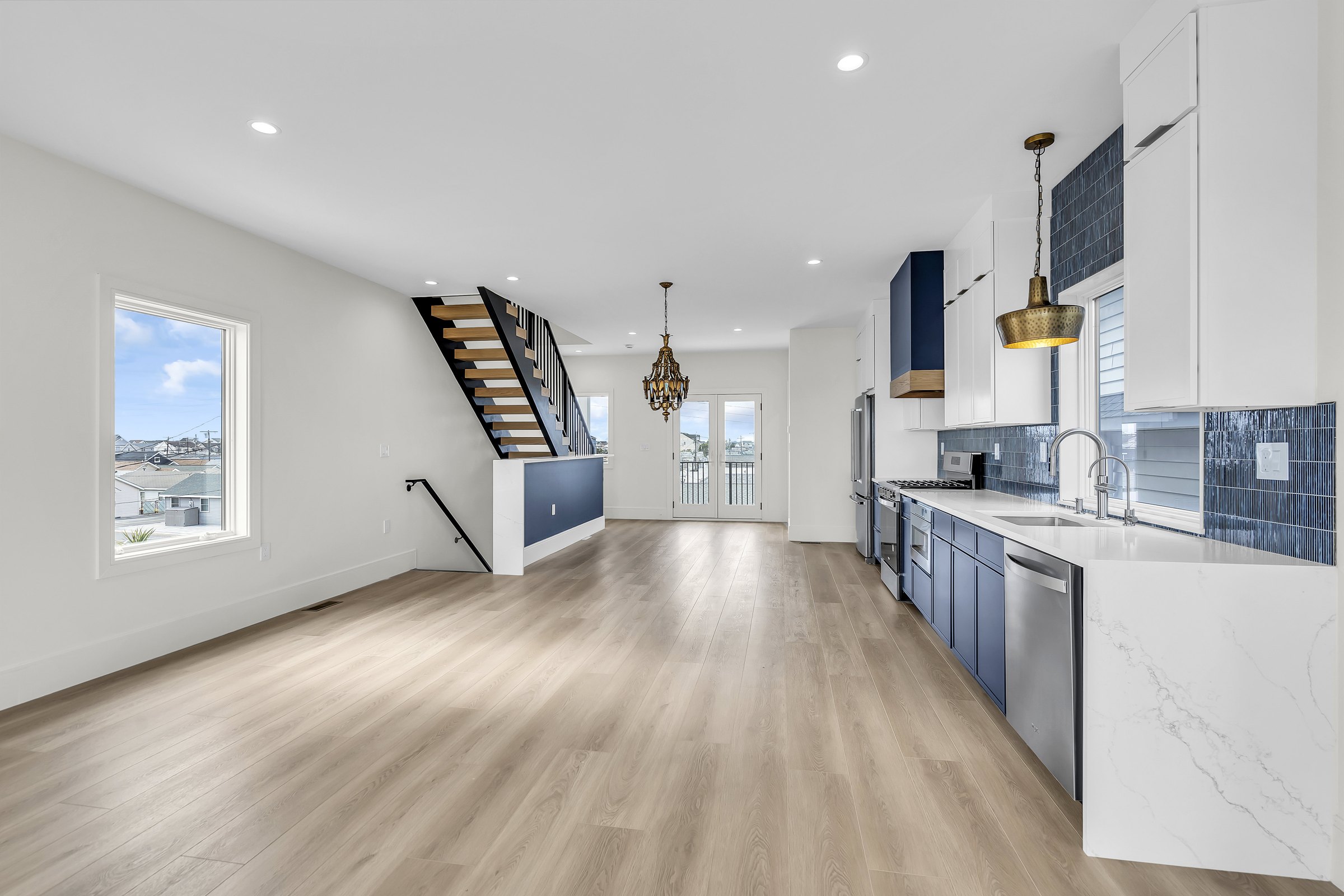Open kitchen and living area at the Wang Residence